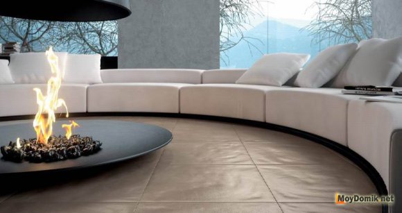 Камин в интерьере гостиной в стиле хай-тек Камин в интерьере гостиной в стиле хай-тек