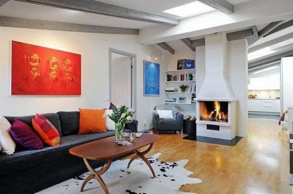 Камин в интерьере мансарды